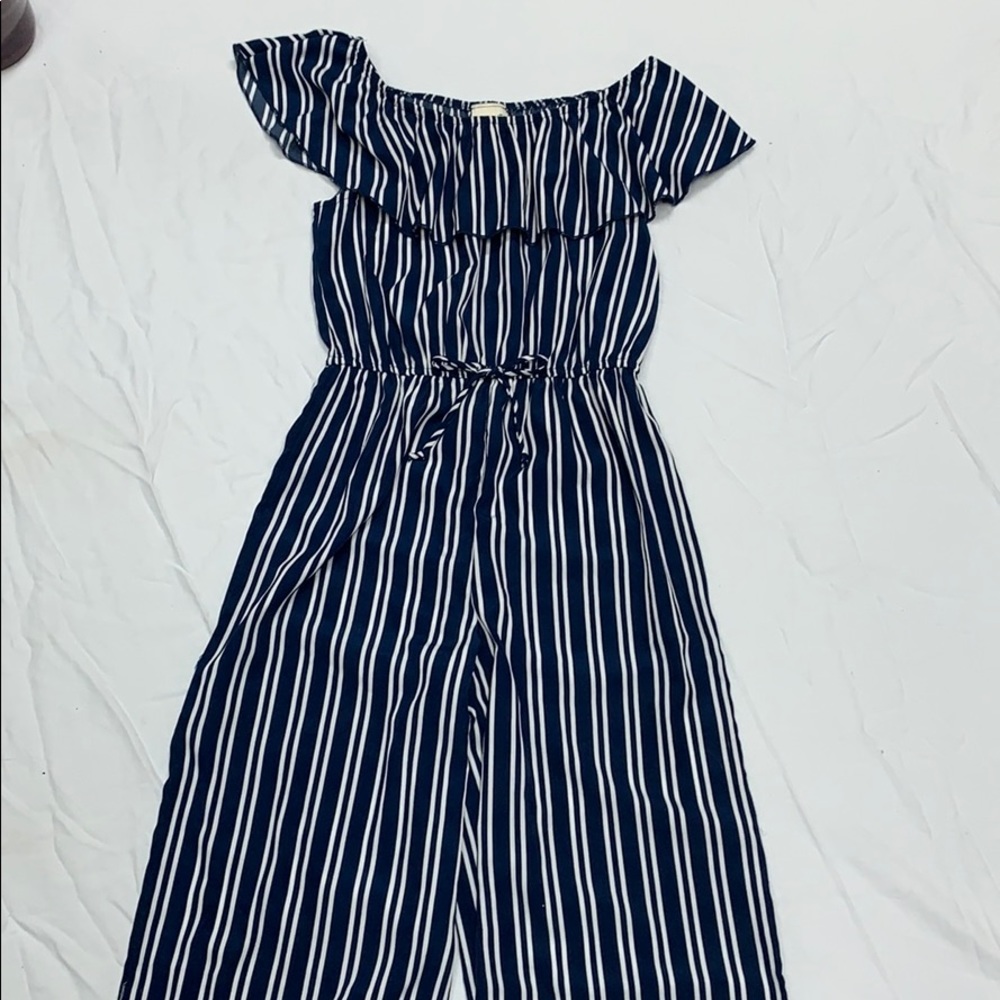 Blue and white romper with ruffled sleeves